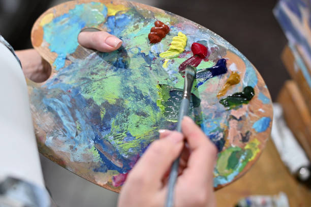 istock Color matching palette with oil paints 1254354977