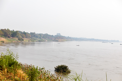 Riverside of Mekong river in east Thailand in province Nakhon Phanom at smog air day