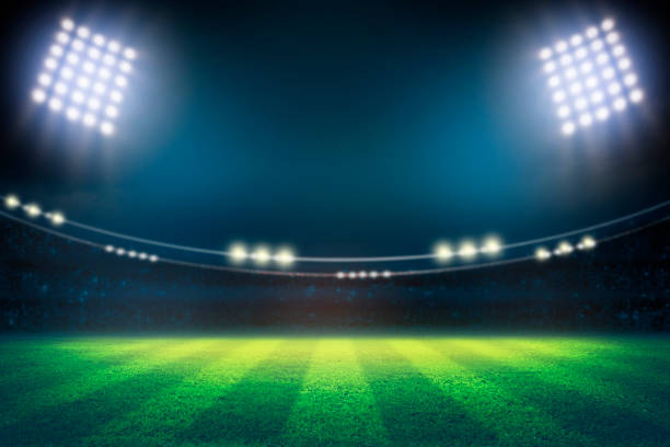 istock lights at night and football stadium 3D 1254358692