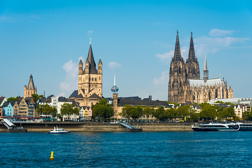 View to the Cologne Cathedral and St. Martin church from the Rheinwiesen