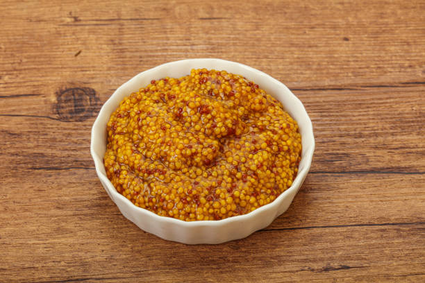 istock Dijon mustard sauce with seeds 1254366201