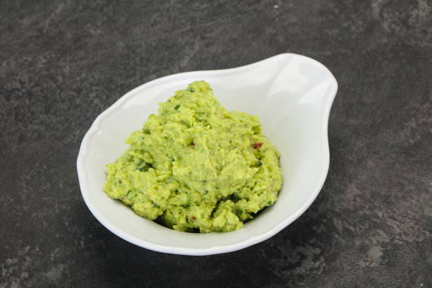 istock Avocado guacamole sauce with chili pepper 1254366257