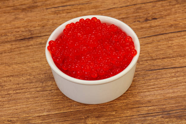 istock Red salmon caviar in the bowl 1254366303