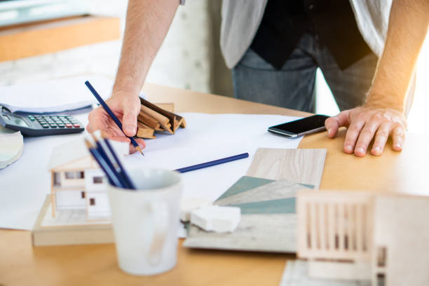 istock Real Estate business interior architect professional teamwork design video conference online meeting new normal yellow safety helmet with Europe Manage and Asian Team with happy smile success contract 1254372629