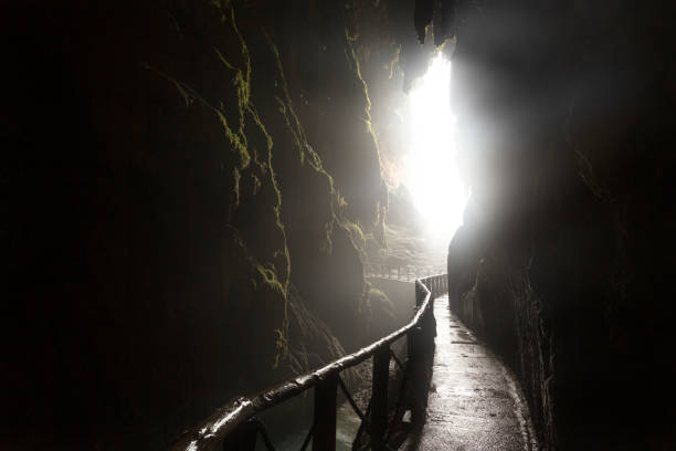 istock Gangway in a hollow that goes towards the light 1254373951