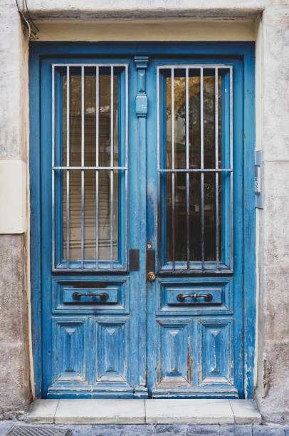 istock A blue old door of an abandoned building 1254374073