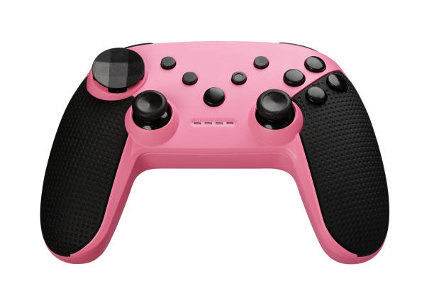 istock modern pink joystick. Video game controller isolated on white background. Clipping path 1254377177