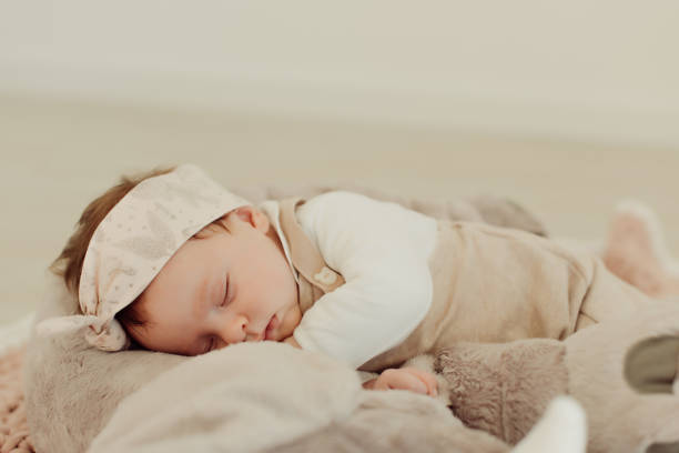 Portrait of a newborn baby sleeping Portrait of a newborn baby sleeping - Natural and soft Light 7676 stock pictures, royalty-free photos & images