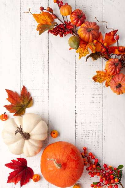 istock Festive autumn decor from pumpkins, berries and leaves 1254380184