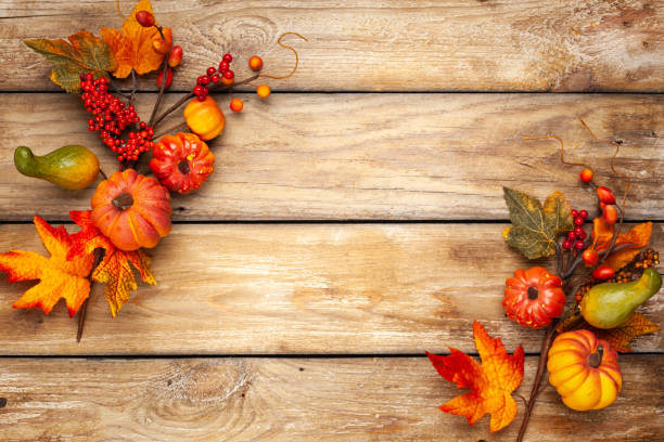 istock Festive autumn decor from pumpkins, berries and leaves 1254380241