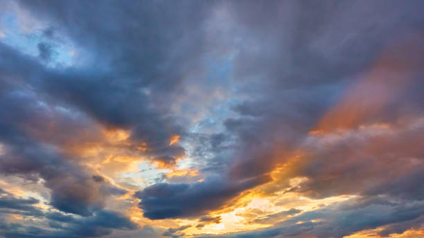 istock Sky with clouds of different colours at sunset 1254383551