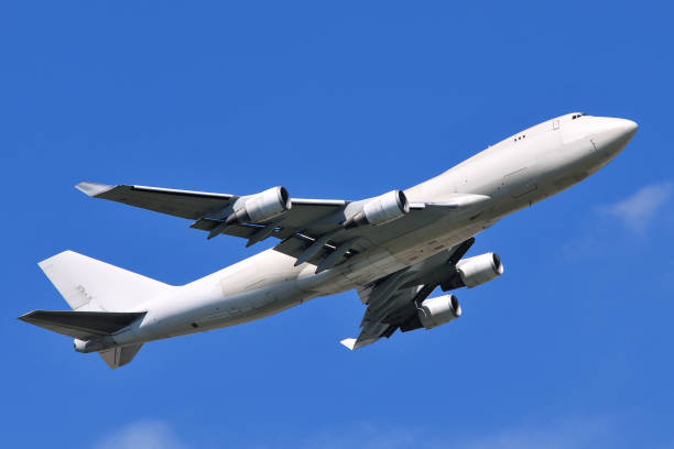 istock Cargo plane taking off from Tokyo airport 1254383608