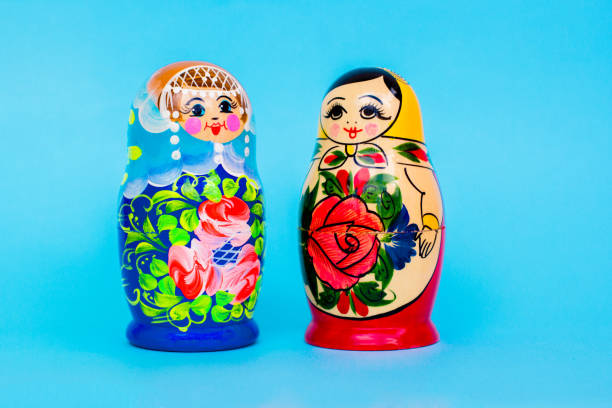 Colorful matryoshka on a blue background, Slavic souvenir.