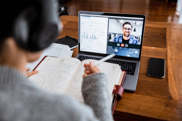 istock Webinar, distance learning. Woman working and studying from home 1254385513