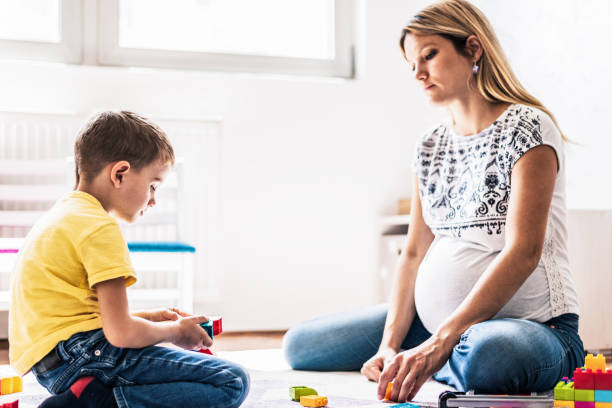 istock Pregnant mother and son 1254390107