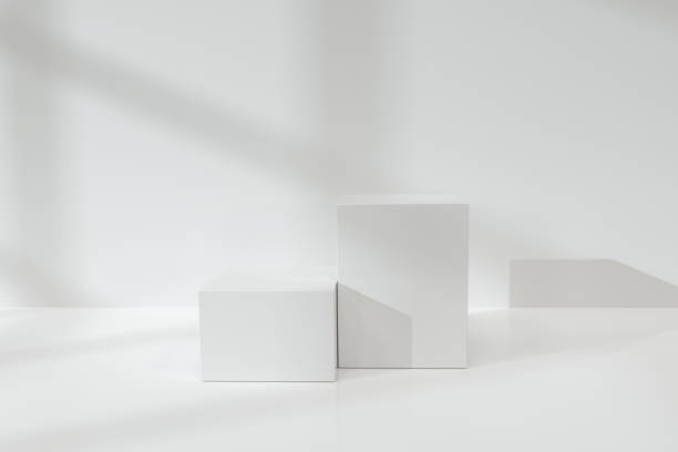 istock White cubic podium on the floor, 3d rendering. 1254395731