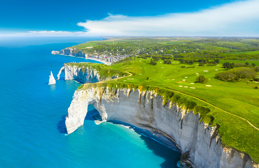 Picturesque panoramic landscape on the cliffs of Etretat. Natural amazing cliffs. Etretat, Normandy, France, La Manche or English Channel. France