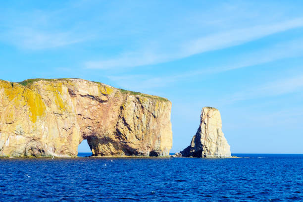 istock Perce rock, at the tip of Gaspe Peninsula 1254400220