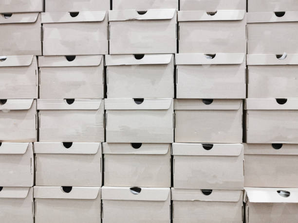 istock Many white box of shop array together in mall 1254400488