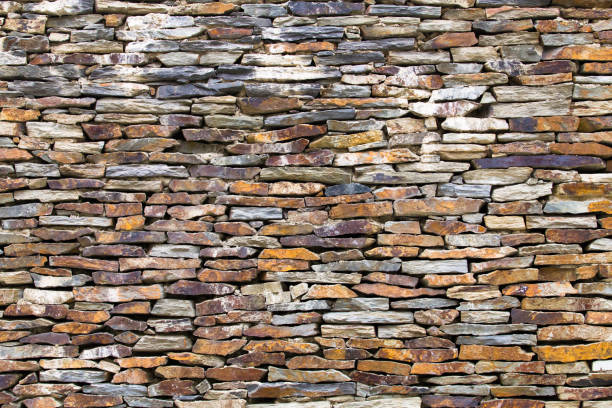 istock The wall is made of crushed stone. 1254400639