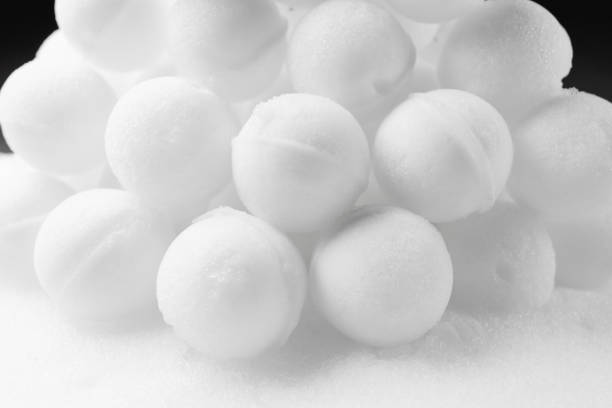 istock many snowballs on white snow background 1254401397