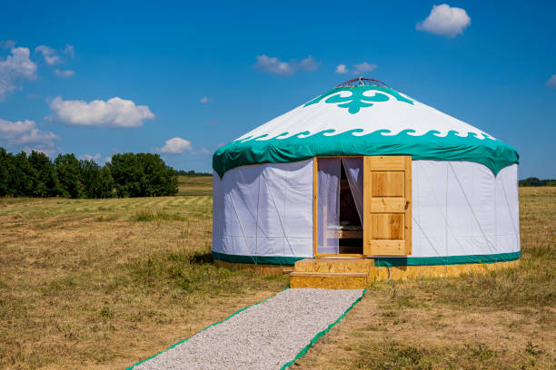 white bashkir yurt stands in the open air in the steppe - grass area field air sky imagens e fotografias de stock