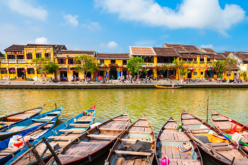 Fishing boats at the riverfront of Hoi An ancient town in Quang Nam Province of Vietnam