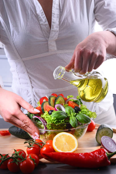 istock Preparation of a vegetable salad from fresh organic ingredients 1254411665