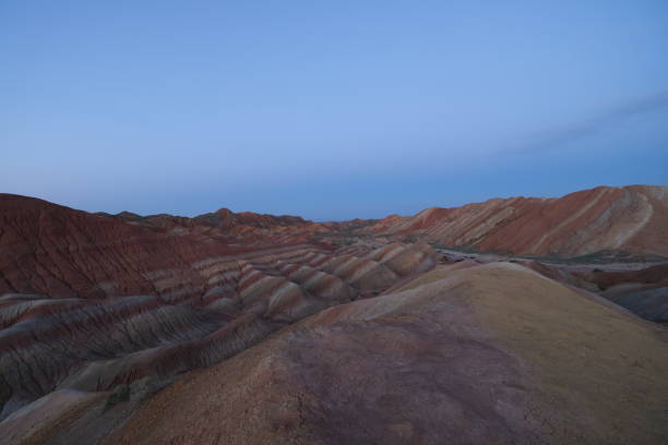 istock colorful Danxia Landform mountains at evening 1254414647