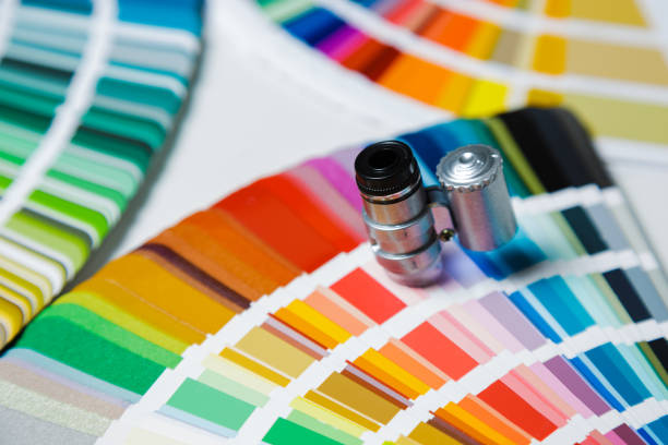 istock Color chart guide with magnifying glass. Close-up 1254416500
