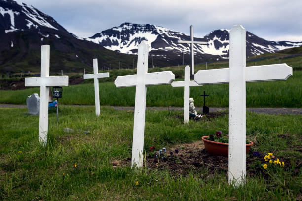 istock Five white crosses in a typical Icelandic Christian cemetery 1254416791