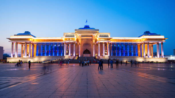 Government Palace in Ulaanbaatar, Mongolia The Government Palace at night. Its located at Chinggis Square or Sukhbaatar Square in Ulaanbaatar, or Ulan Bator city of Mongolia independent mongolia stock pictures, royalty-free photos & images