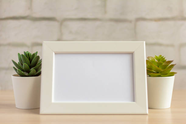 istock An empty photo frame on a table or shelf with a copy of the space 1254418124