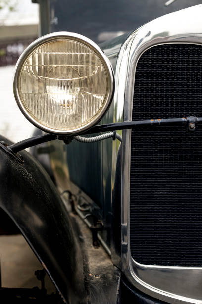 istock Round headlight of an old classic car 1254418138