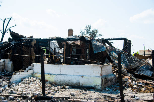 istock Ruins of house after fire 1254418439
