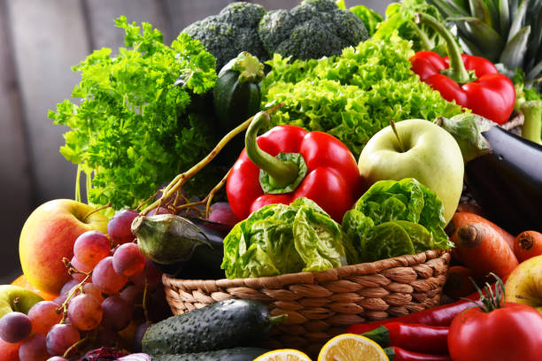 istock Composition with assorted organic vegetables and fruits 1254420978