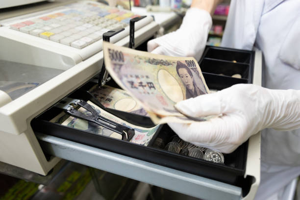 istock Sterilizing cash register with alcohol 1254423423