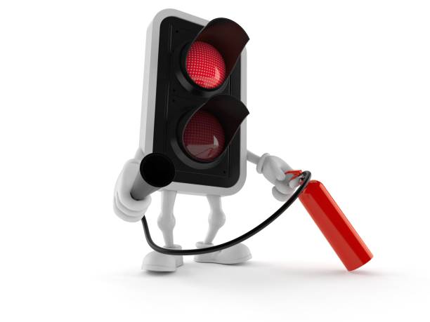 istock Red traffic light character holding fire extinguisher 1254426954