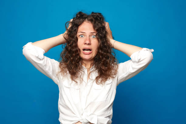 istock Woman with negative face emotions. 1254428253