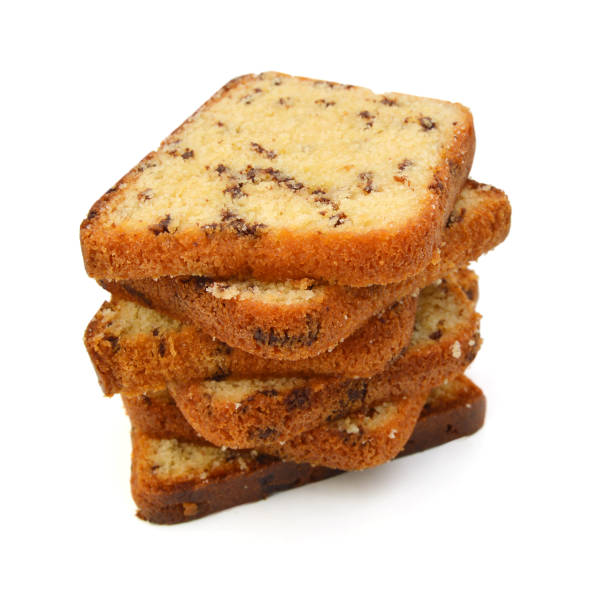 istock Sliced butter cake on white background 1254428473