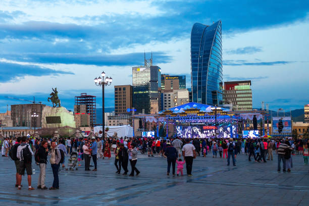 Sukhbaatar Square in Ulaanbaatar, Mongolia ULAANBAATAR, MONGOLIA - JULY 11, 2016: Celebration of Naadam traditional festival on Chinggis Square or Sukhbaatar Square in Ulaanbaatar or Ulan Bator city, Mongolia central asian ethnicity stock pictures, royalty-free photos & images