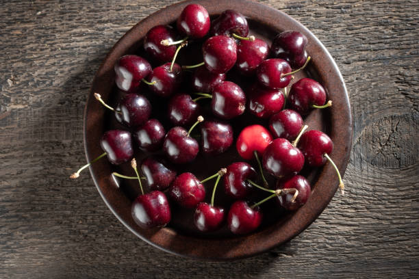 istock Fresh cherries with droplets of water 1254429808