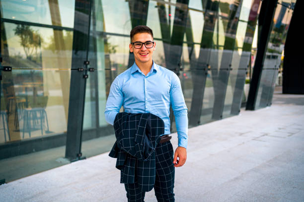 istock Young cheerful business man 1254430219
