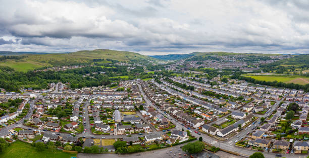 istock Panoramic aerial view of a small Welsh town surrounded by hills (Ebbw Vale, South Wales, UK) 1254433247