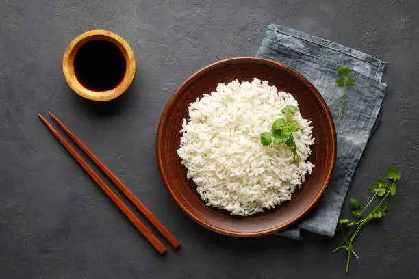 Photo of Boiled rice in a brown plate