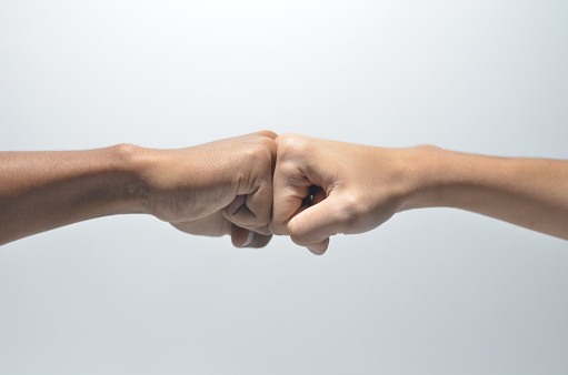 Fist Hand of Friendship on isolated white background