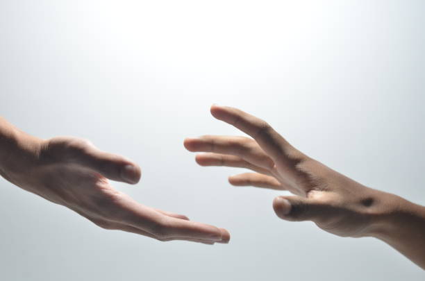Helping hands, reaching out for help