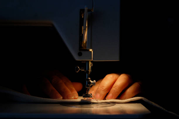 istock Woman working on a sewing machine. 1254443107