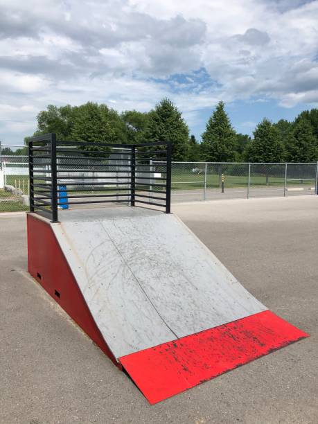 istock Ramp for red skateboard with metal side and support 1254445733