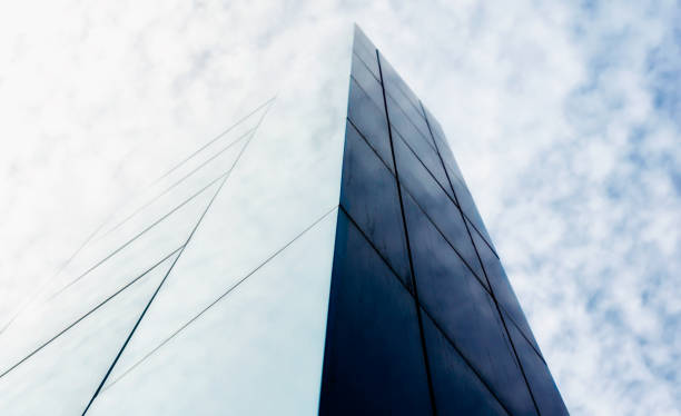 istock wall of a modern building against the sky and clouds 1254450806